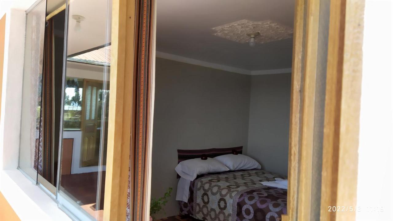 Tikawasi Homestay Comunidad Pueblo Isla Amantani Jose Luis Ocosuyo Kültér fotó
